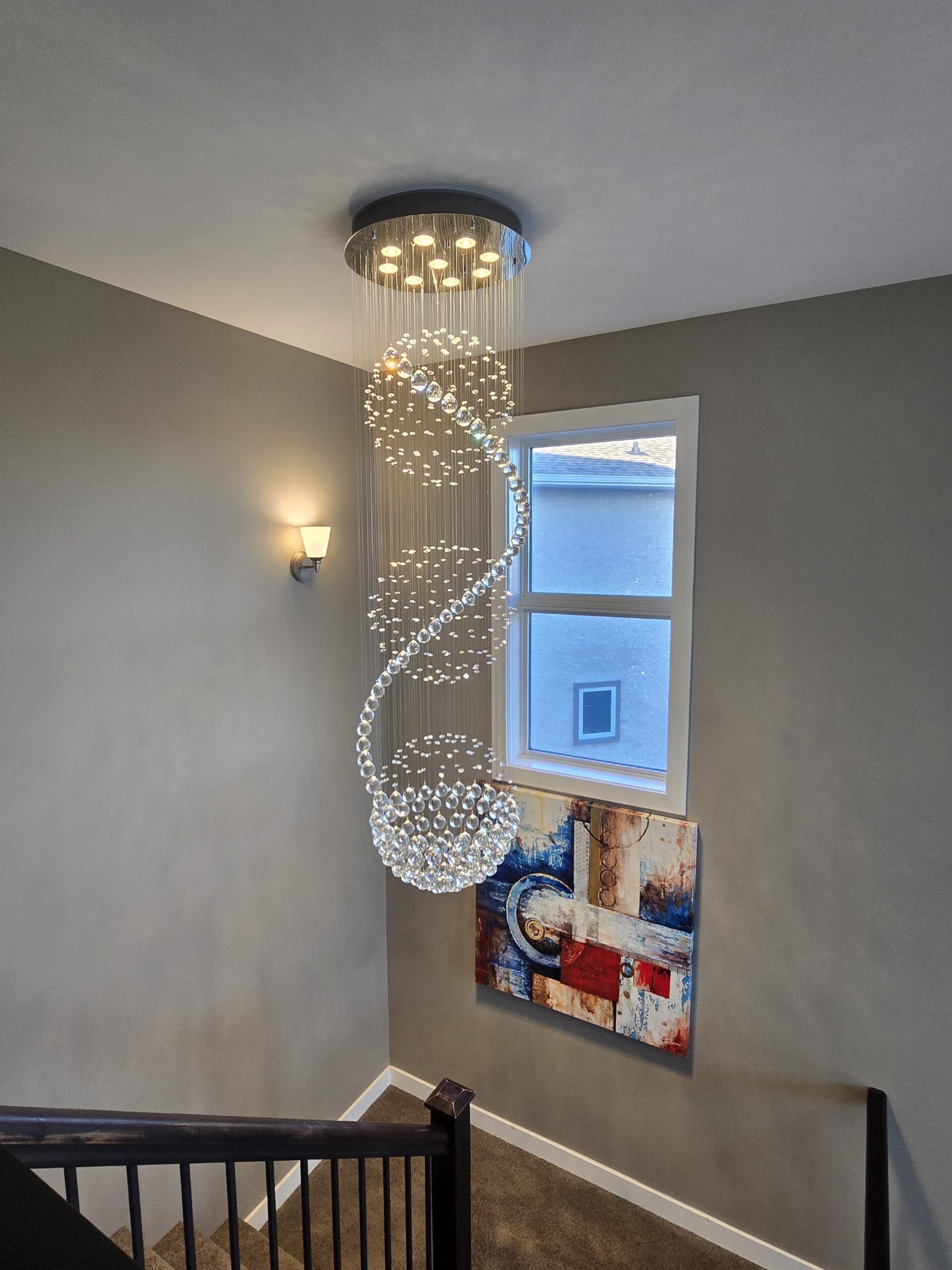 Lighting installation in Winnipeg home – chandelier and decorative light fixture installed by licensed electrician – Sparxx Electrical Contractors