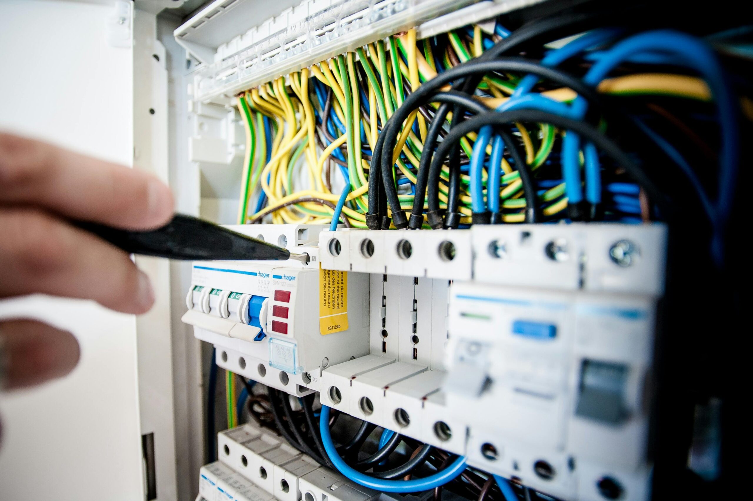 Commercial electrician in Winnipeg working on electrical system in office or retail space – Sparxx Electrical Contractors
