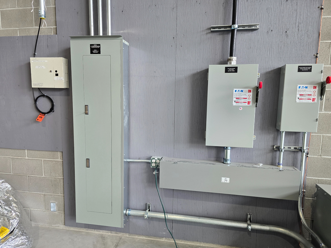 Industrial electrician in Winnipeg working on electrical control panels and industrial wiring – Sparxx Electrical Contractors